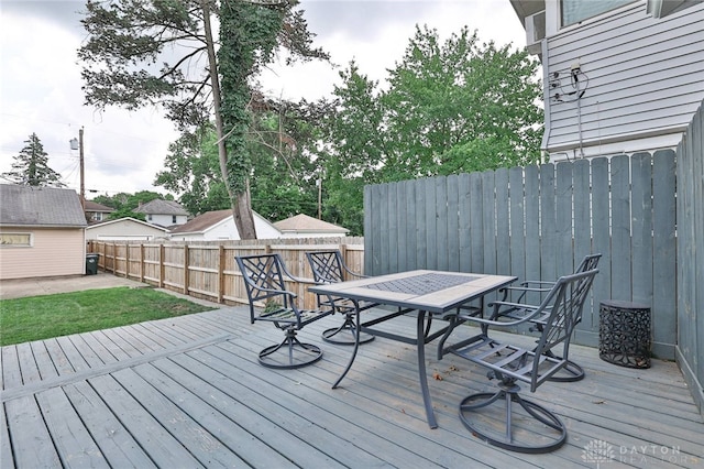 15 Harrison St, Middletown, OH 45042 - deck featuring outdoor dining space and a fenced backyard