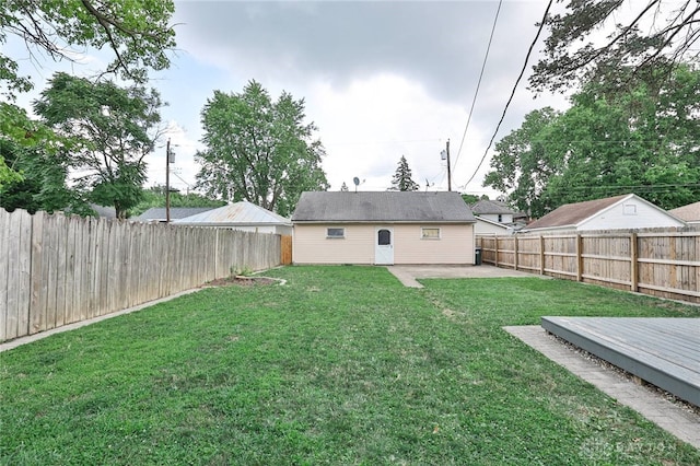 15 Harrison St, Middletown, OH 45042 - fenced backyard with a deck and a patio