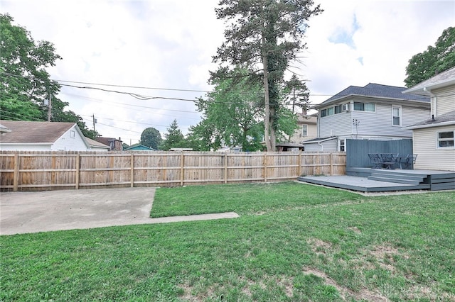 15 Harrison St, Middletown, OH 45042 - fenced backyard featuring a deck and a patio area