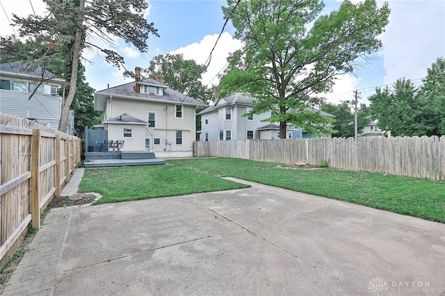 15 Harrison St, Middletown, OH 45042 - back of house with a patio, a fenced backyard, and a wooden deck