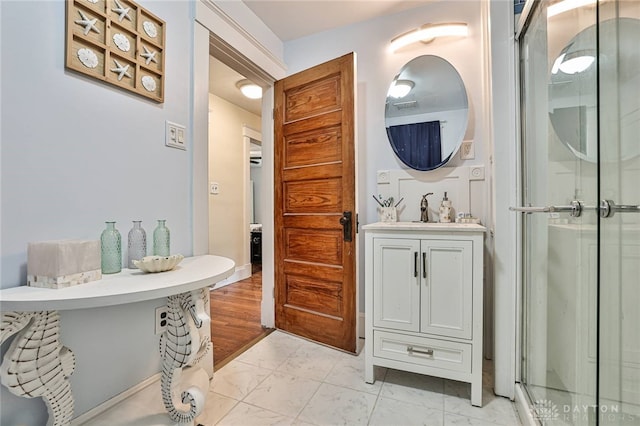 15 Harrison St, Middletown, OH 45042 - bathroom with marble look tiles, vanity, and a stall shower
