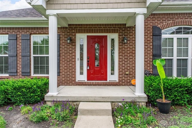 2073 Lincolnshire Dr, Beavercreek, OH 45434 - doorway to property with brick siding and roof with shingles
