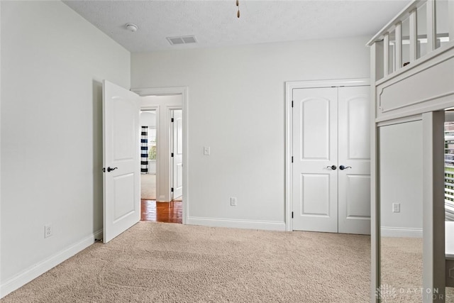 2073 Lincolnshire Dr, Beavercreek, OH 45434 - unfurnished bedroom featuring carpet flooring and a closet