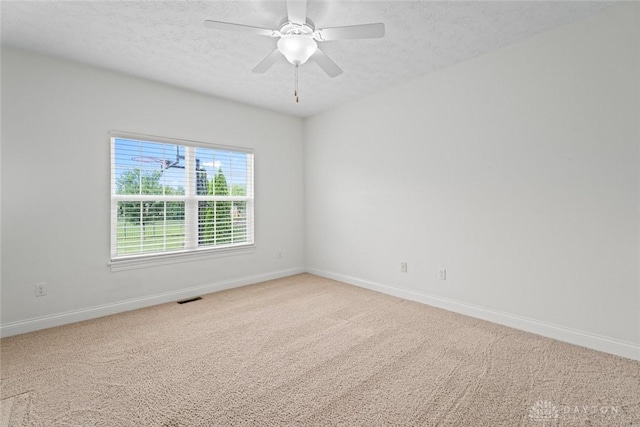 2073 Lincolnshire Dr, Beavercreek, OH 45434 - empty room with light carpet, a textured ceiling, and a ceiling fan