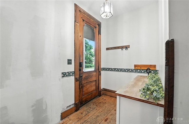 116 Elm St, Franklin, OH 45005 - doorway featuring light wood finished floors and baseboards
