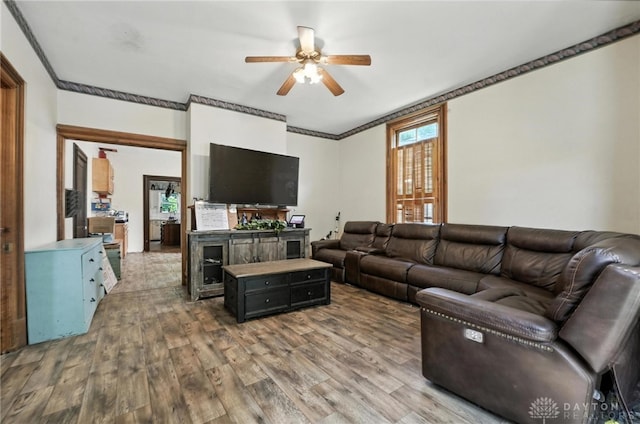 116 Elm St, Franklin, OH 45005 - living area featuring a ceiling fan, wood finished floors, and ornamental molding