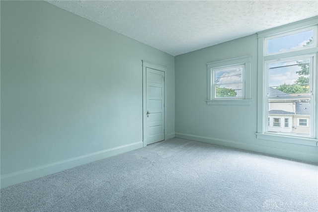 19 Mckinley St, Middletown, OH 45042 - carpeted spare room featuring a textured ceiling and baseboards