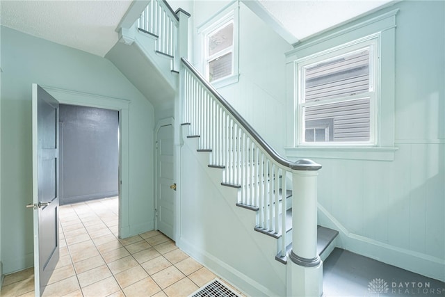 19 Mckinley St, Middletown, OH 45042 - stairway featuring tile patterned flooring and baseboards