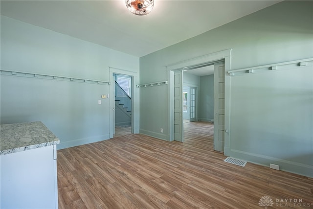 19 Mckinley St, Middletown, OH 45042 - unfurnished dining area featuring stairs and light wood-type flooring