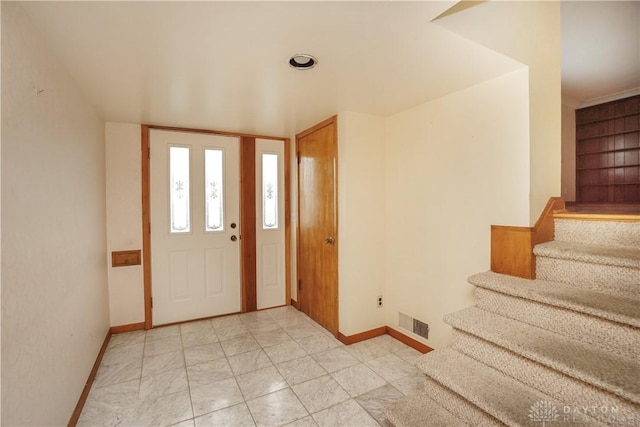 702 W Sharon Rd, Forest Park, OH 45240 - entrance foyer featuring baseboards and stairs
