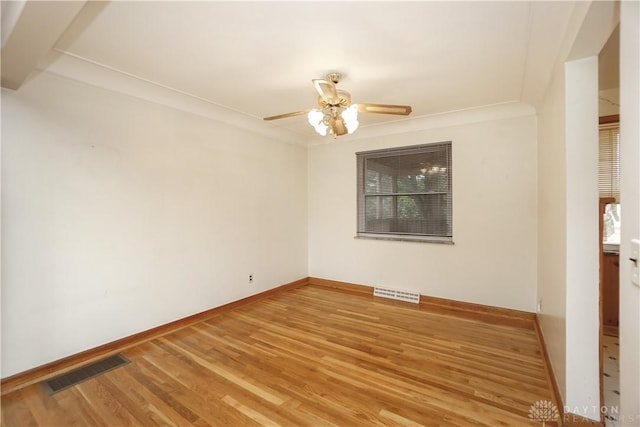 702 W Sharon Rd, Forest Park, OH 45240 - unfurnished room with light wood-style floors and a ceiling fan