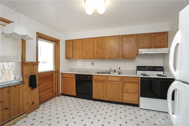 702 W Sharon Rd, Forest Park, OH 45240 - kitchen with white appliances, under cabinet range hood, a baseboard heating unit, light flooring, and brown cabinets