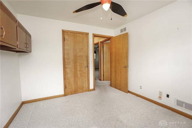 702 W Sharon Rd, Forest Park, OH 45240 - unfurnished room with ceiling fan and carpet flooring