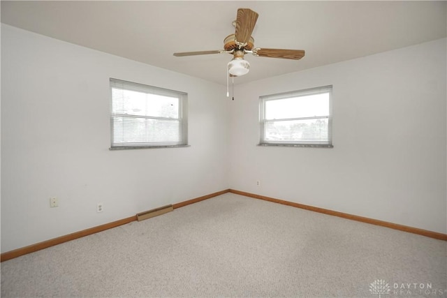 702 W Sharon Rd, Forest Park, OH 45240 - carpeted empty room with baseboards