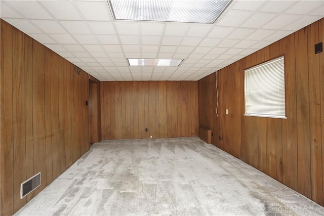 702 W Sharon Rd, Forest Park, OH 45240 - unfurnished room featuring light carpet and wood walls