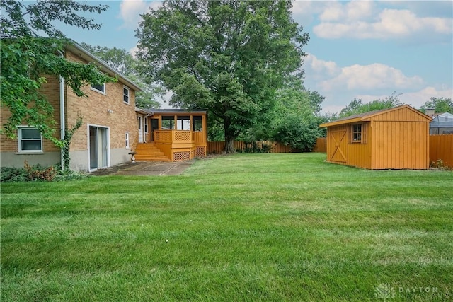 702 W Sharon Rd, Forest Park, OH 45240 - fenced backyard featuring a shed and a deck
