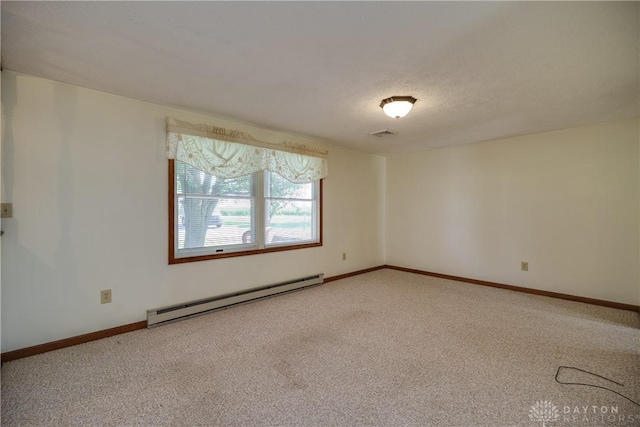 789 W Krepps Rd, Xenia, OH 45385 - empty room with baseboard heating and carpet floors