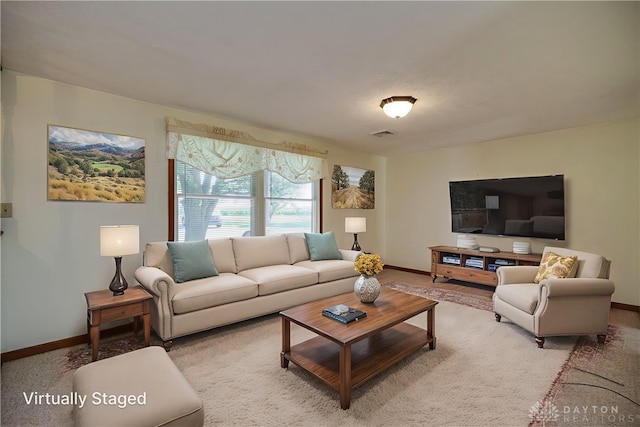 789 W Krepps Rd, Xenia, OH 45385 - living room featuring baseboards and light carpet