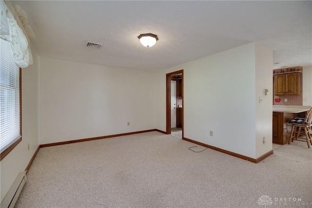 789 W Krepps Rd, Xenia, OH 45385 - unfurnished room featuring light carpet and baseboard heating
