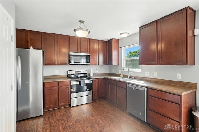 171 Shanda Dr, Monroe, OH 45050 - kitchen with appliances with stainless steel finishes and dark wood-style floors