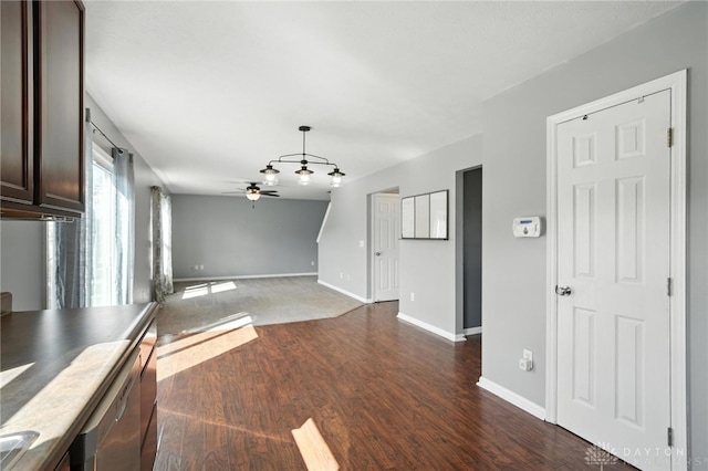 171 Shanda Dr, Monroe, OH 45050 - unfurnished dining area with a ceiling fan and dark wood-type flooring