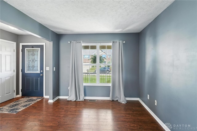 171 Shanda Dr, Monroe, OH 45050 - entrance foyer with wood finished floors and a textured ceiling