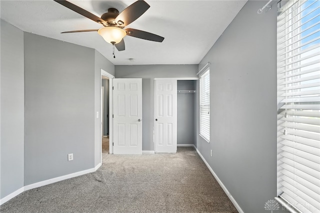 171 Shanda Dr, Monroe, OH 45050 - unfurnished bedroom featuring carpet floors, a closet, and a ceiling fan
