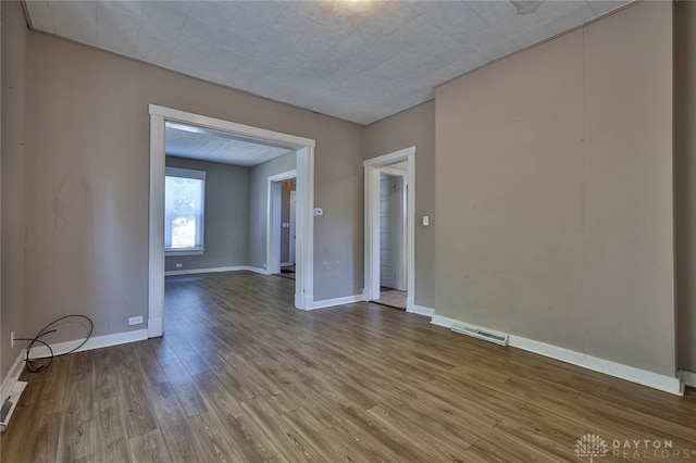 578 Considine Ave, Cincinnati, OH 45205 - empty room with wood finished floors and baseboards