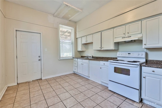 578 Considine Ave, Cincinnati, OH 45205 - kitchen featuring white electric stove, under cabinet range hood, dark countertops, and light tile patterned flooring