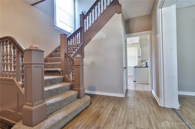 578 Considine Ave, Cincinnati, OH 45205 - staircase featuring wood finished floors and baseboards