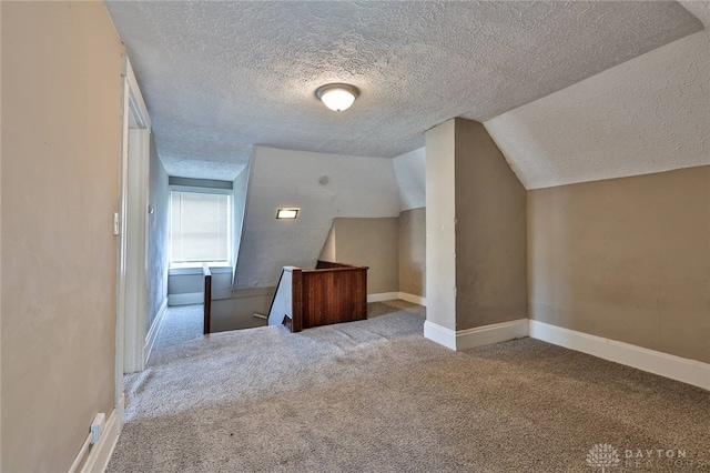 578 Considine Ave, Cincinnati, OH 45205 - additional living space featuring a textured ceiling, carpet floors, and vaulted ceiling