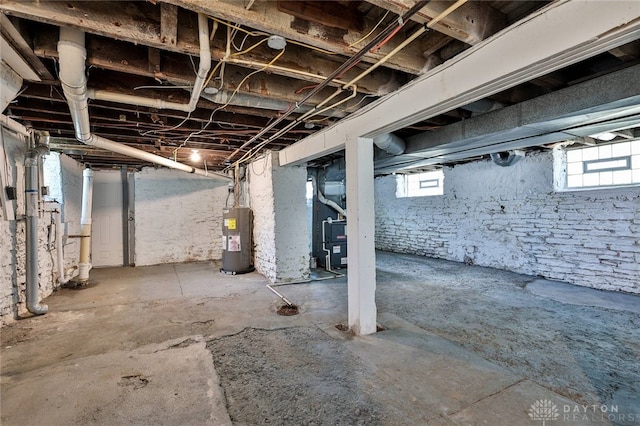 578 Considine Ave, Cincinnati, OH 45205 - below grade area featuring electric water heater and healthy amount of natural light