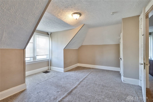 578 Considine Ave, Cincinnati, OH 45205 - bonus room featuring a textured ceiling, carpet floors, and vaulted ceiling