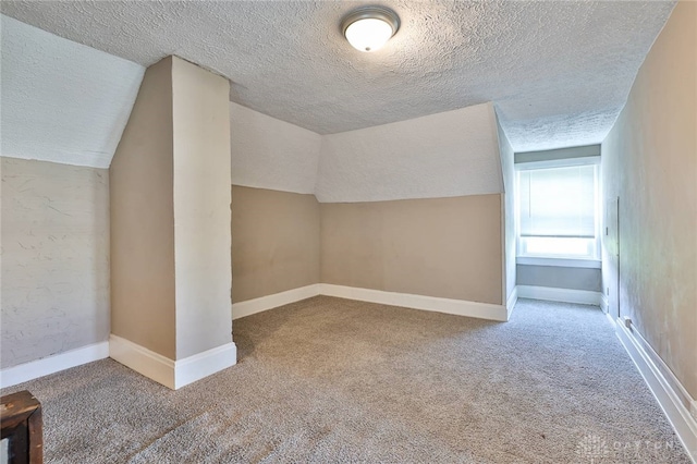 578 Considine Ave, Cincinnati, OH 45205 - additional living space featuring a textured ceiling, carpet floors, and lofted ceiling