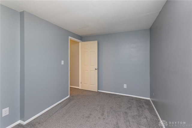 6235 Pheasant Hill Rd, Dayton, OH 45424 - empty room featuring baseboards and carpet