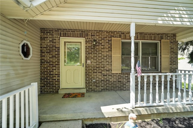 500 Smalley Blvd, Hamilton, OH 45013 - doorway to property featuring a porch and brick siding