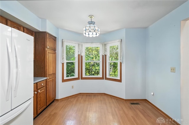 500 Smalley Blvd, Hamilton, OH 45013 - unfurnished dining area with light wood finished floors and baseboards