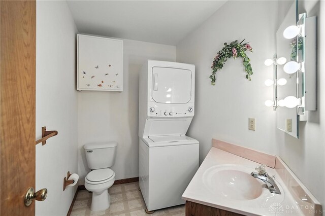 500 Smalley Blvd, Hamilton, OH 45013 - bathroom featuring stacked washer / drying machine, tile patterned floors, and vanity