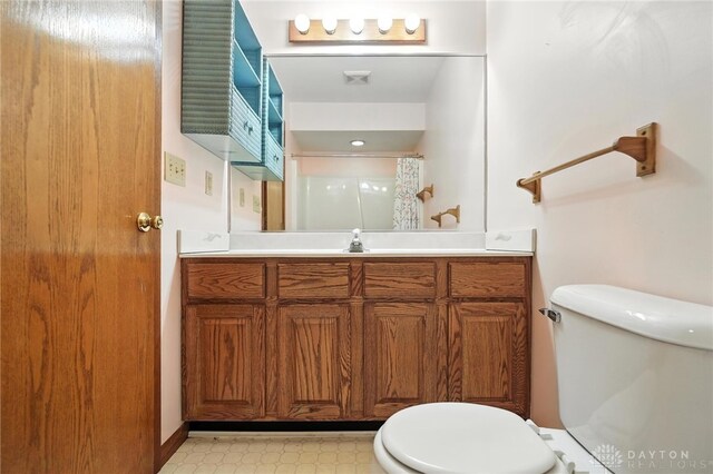 500 Smalley Blvd, Hamilton, OH 45013 - full bath with tile patterned floors, vanity, and a shower with shower curtain