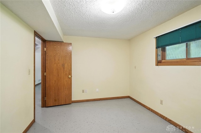 500 Smalley Blvd, Hamilton, OH 45013 - spare room with a textured ceiling and baseboards