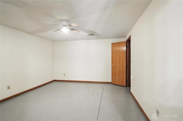 500 Smalley Blvd, Hamilton, OH 45013 - unfurnished room with ceiling fan, finished concrete floors, and a textured ceiling