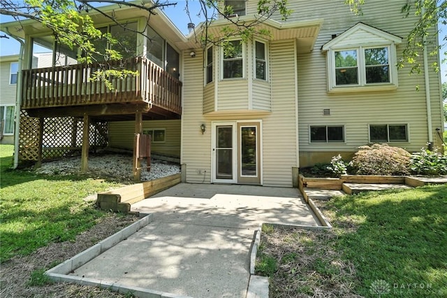 500 Smalley Blvd, Hamilton, OH 45013 - back of house featuring a yard, a patio area, and a sunroom