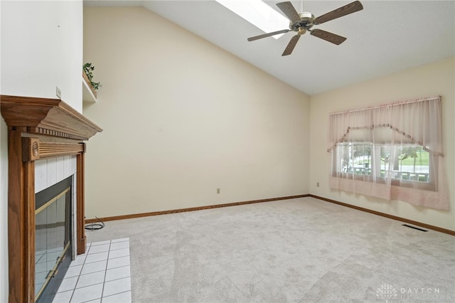 500 Smalley Blvd, Hamilton, OH 45013 - unfurnished living room featuring lofted ceiling, light colored carpet, ceiling fan, and a fireplace