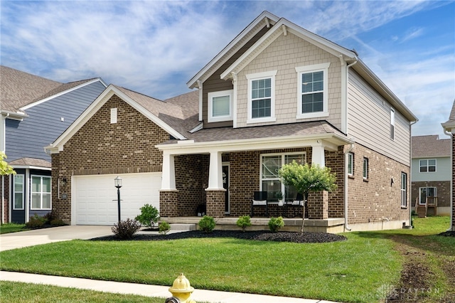 598 Twilight Ln, Dayton, OH 45440 - craftsman-style home featuring brick siding, a porch, a front lawn, concrete driveway, and a garage