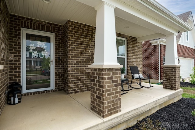 598 Twilight Ln, Dayton, OH 45440 - entrance to property with a porch and brick siding