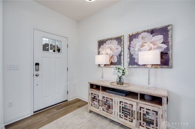 598 Twilight Ln, Dayton, OH 45440 - foyer with wood finished floors and baseboards