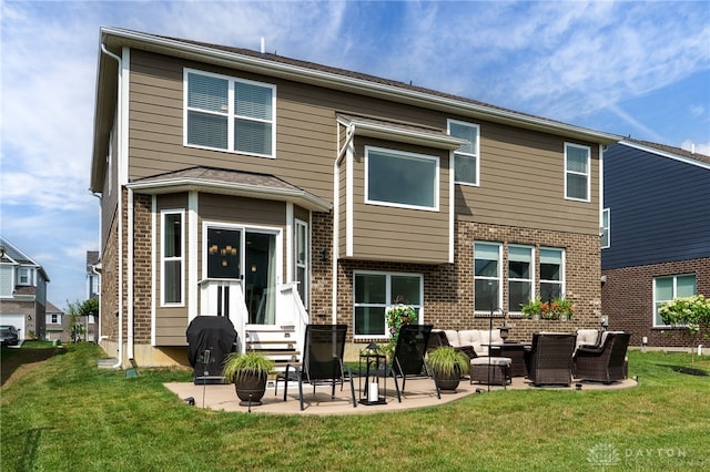 598 Twilight Ln, Dayton, OH 45440 - back of house featuring outdoor lounge area, a lawn, and brick siding