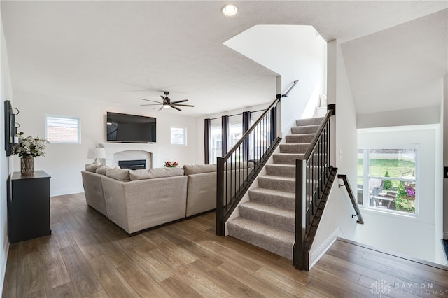598 Twilight Ln, Dayton, OH 45440 - living area featuring ceiling fan, stairway, wood finished floors, a fireplace, and recessed lighting