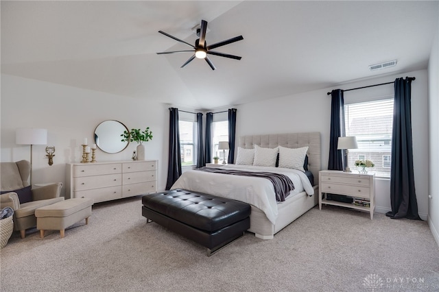 598 Twilight Ln, Dayton, OH 45440 - carpeted bedroom with multiple windows, ceiling fan, and vaulted ceiling