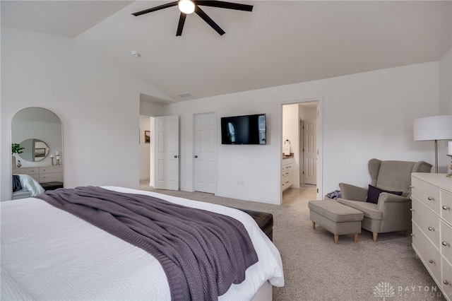 598 Twilight Ln, Dayton, OH 45440 - bedroom featuring light colored carpet, vaulted ceiling, ceiling fan, and ensuite bath